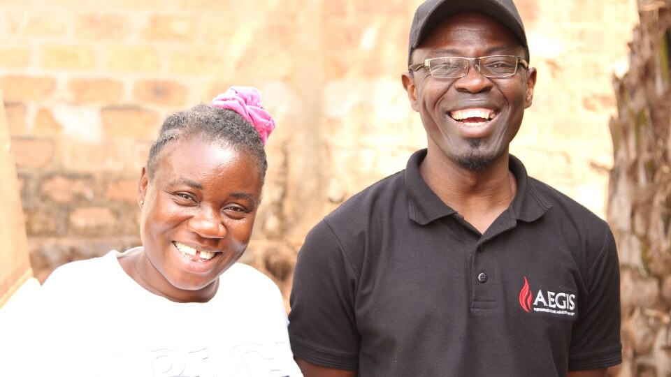 Alain Lazaret - Aegis Trust Representative in the Central African Republic - with a participant in an Aegis Peace Education Workshop