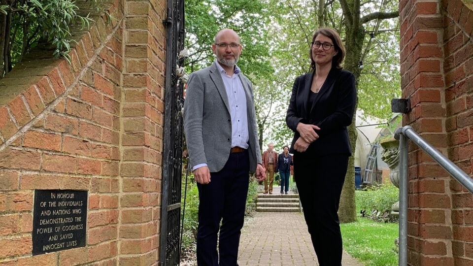 Incoming Aegis Chair Jenny Ohlsson with Aegis CEO and founder James Smith at the UK National Holocaust Centre's Gateway of the Righteous - opened by the Swedish Ambassador to the UK in September 2001
