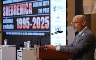 Aegis Founder Dr James Smith speaks in Sarajevo City Hall 8 July 2025 - photo by P-CRC